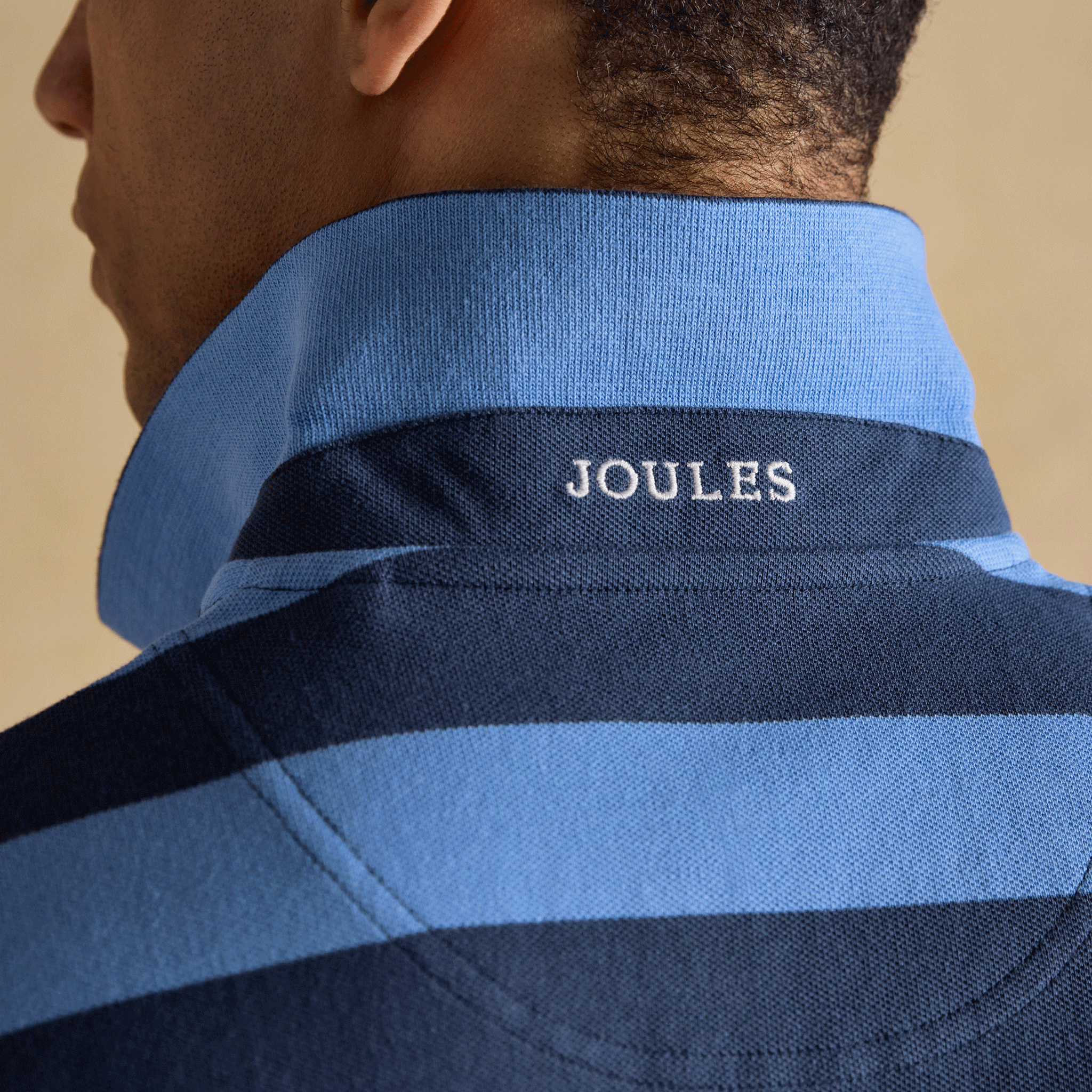 Joules Woody Cotton Pique Polo Shirt in Blue & Navy Stripe
