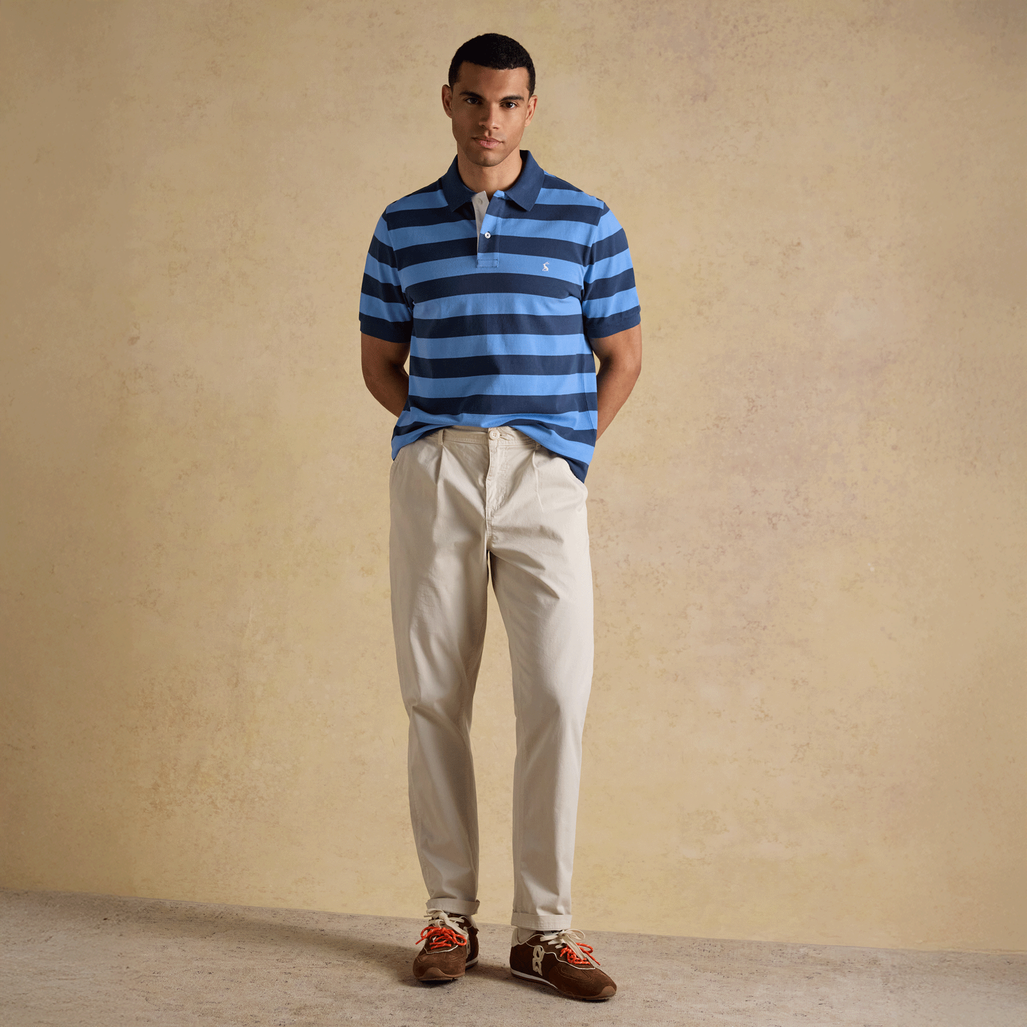 Joules Woody Cotton Pique Polo Shirt in Blue & Navy Stripe