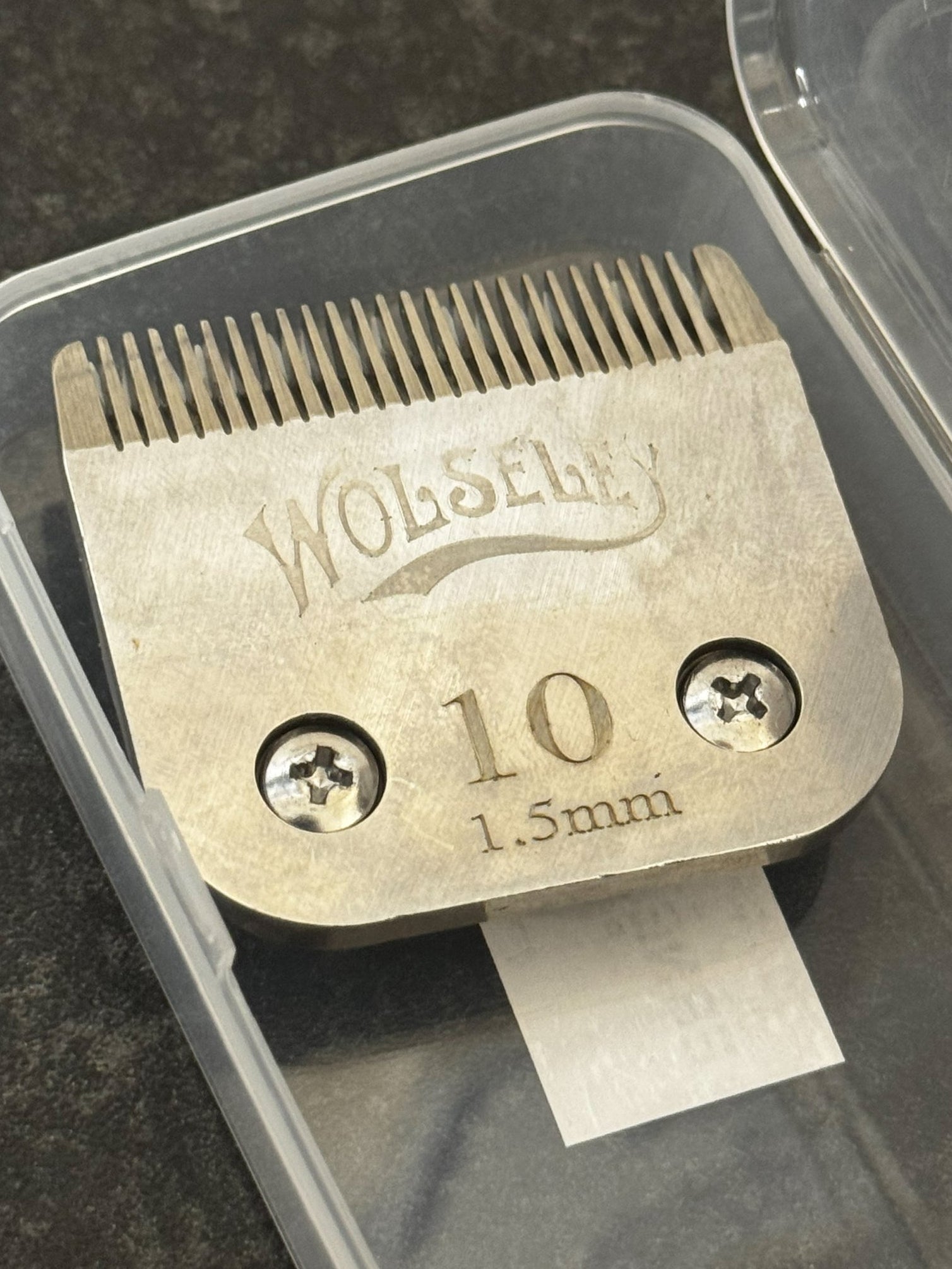 Wolseley hair clipper blade with size 10 and 1.5mm on a clear plastic case.